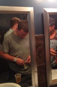 johnny-manziel-rolling-bills-bathroom-money